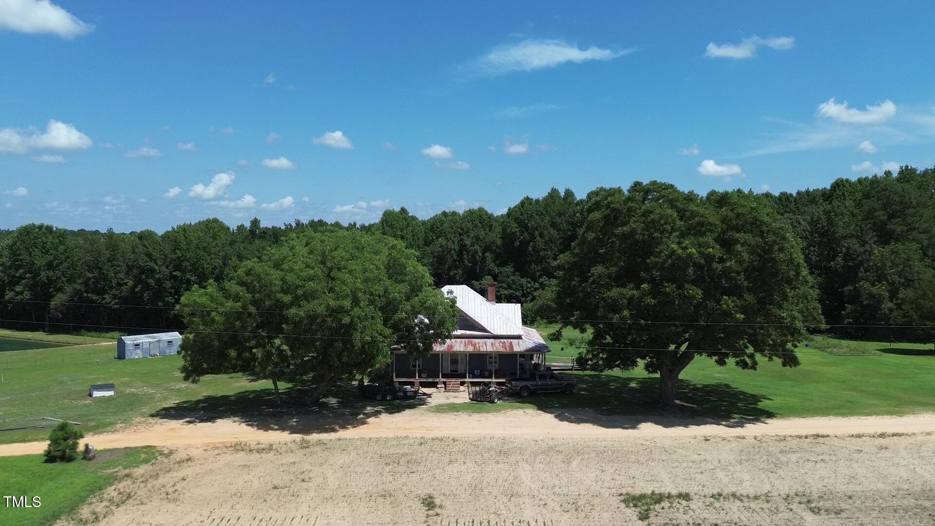 1200 D Morgan Road Benson, NC 27504 - Photo 5 of 35 a garden view with a seating space