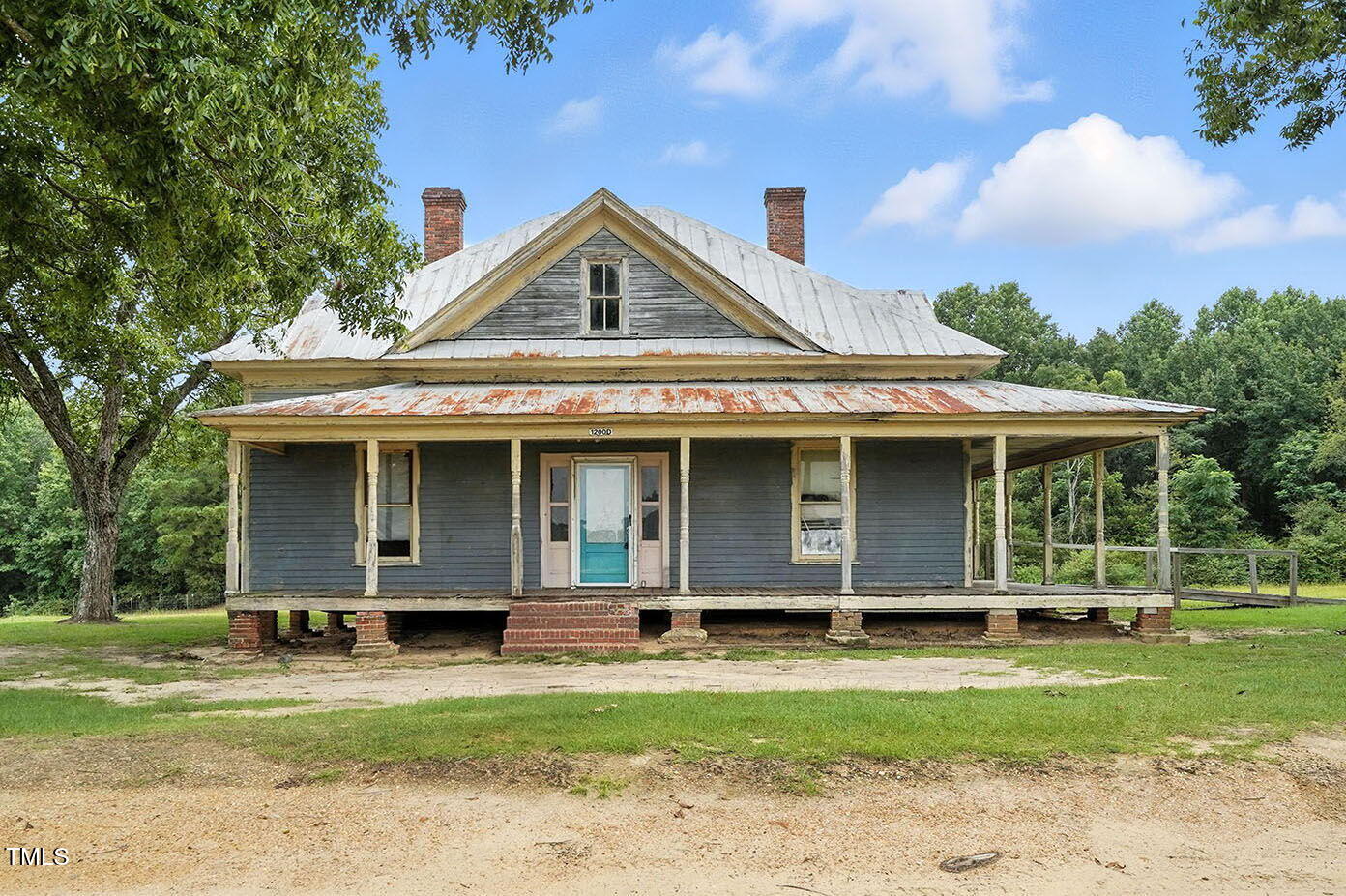 1200 D Morgan Road Benson, NC 27504 - Photo 6 of 35 a front view of a house with a garden