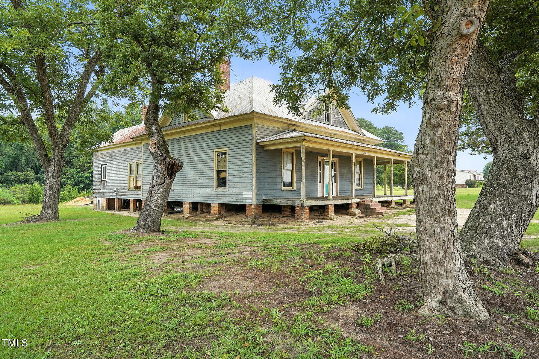 1200 D Morgan Road Benson, NC 27504 - Photo 7 of 35 a view of a house with a yard