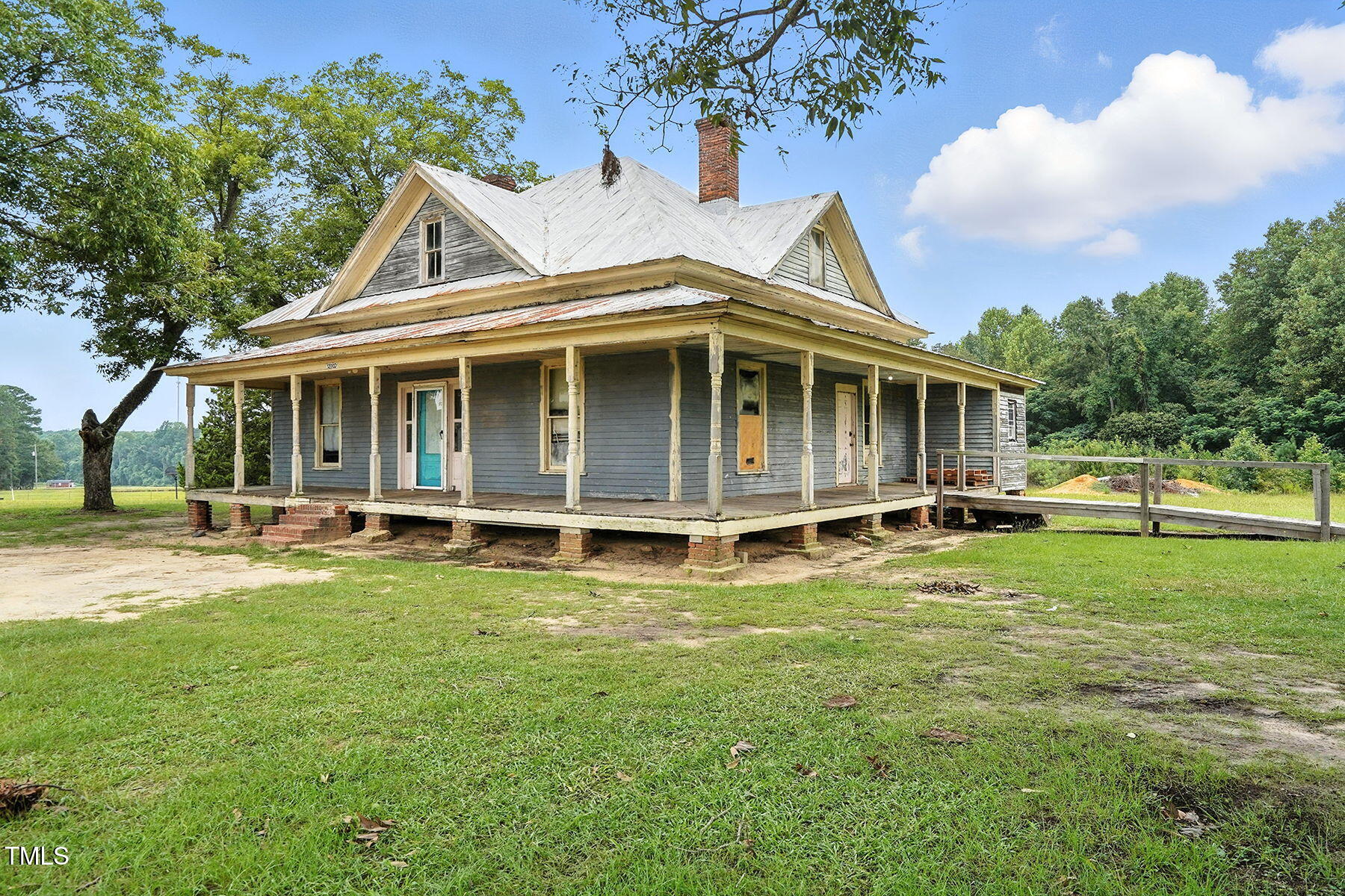 1200 D Morgan Road Benson, NC 27504 - Photo 8 of 35 a view of a house with a yard balcony and sitting area