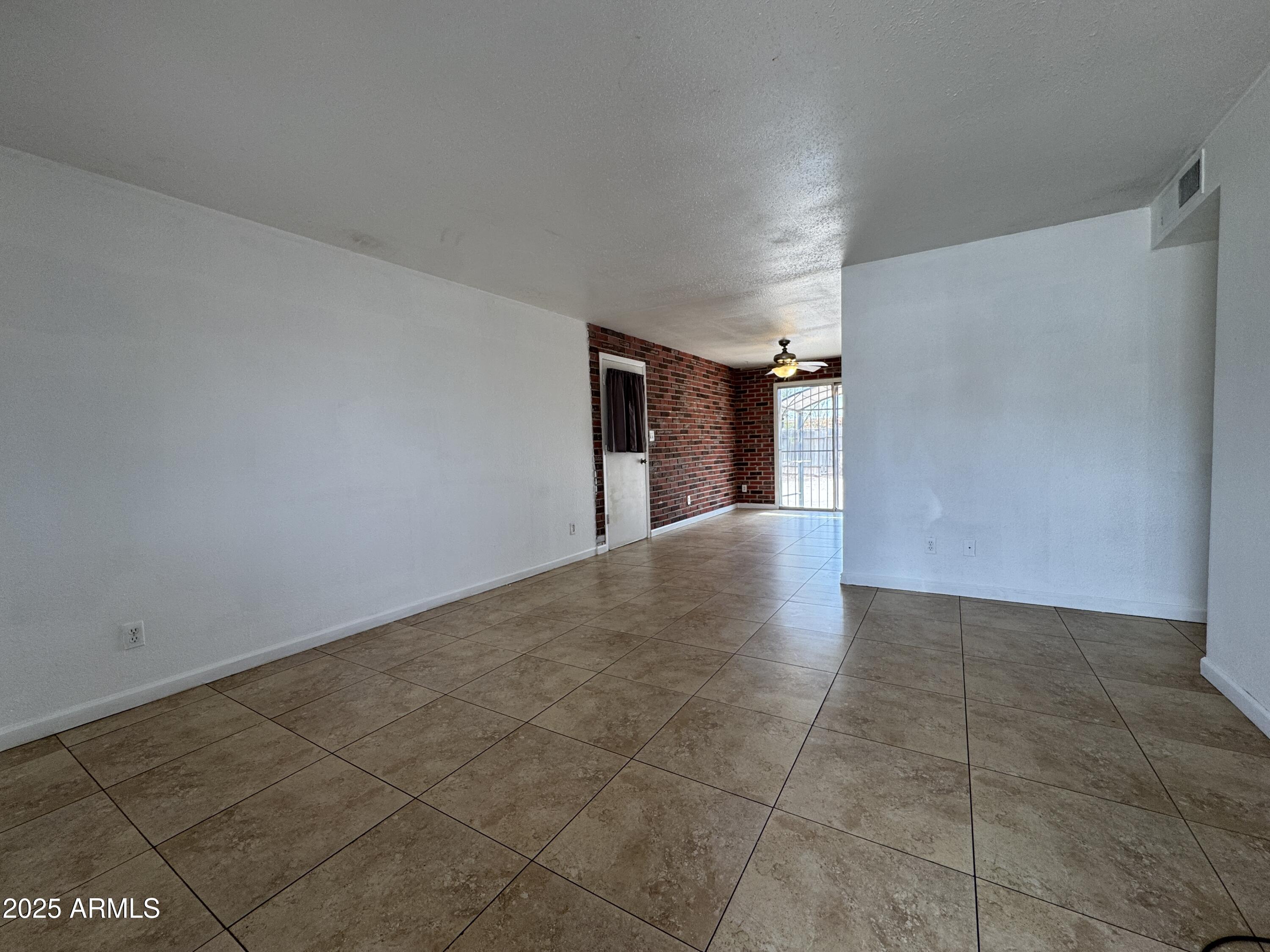 7967 West Highland Avenue Phoenix, AZ 85033 - Photo 4 of 16 a view of a hallway