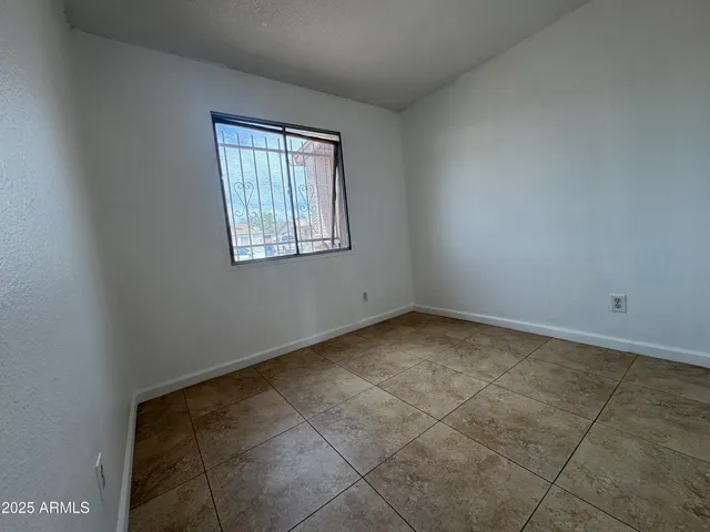 a view of a room that has a window in it