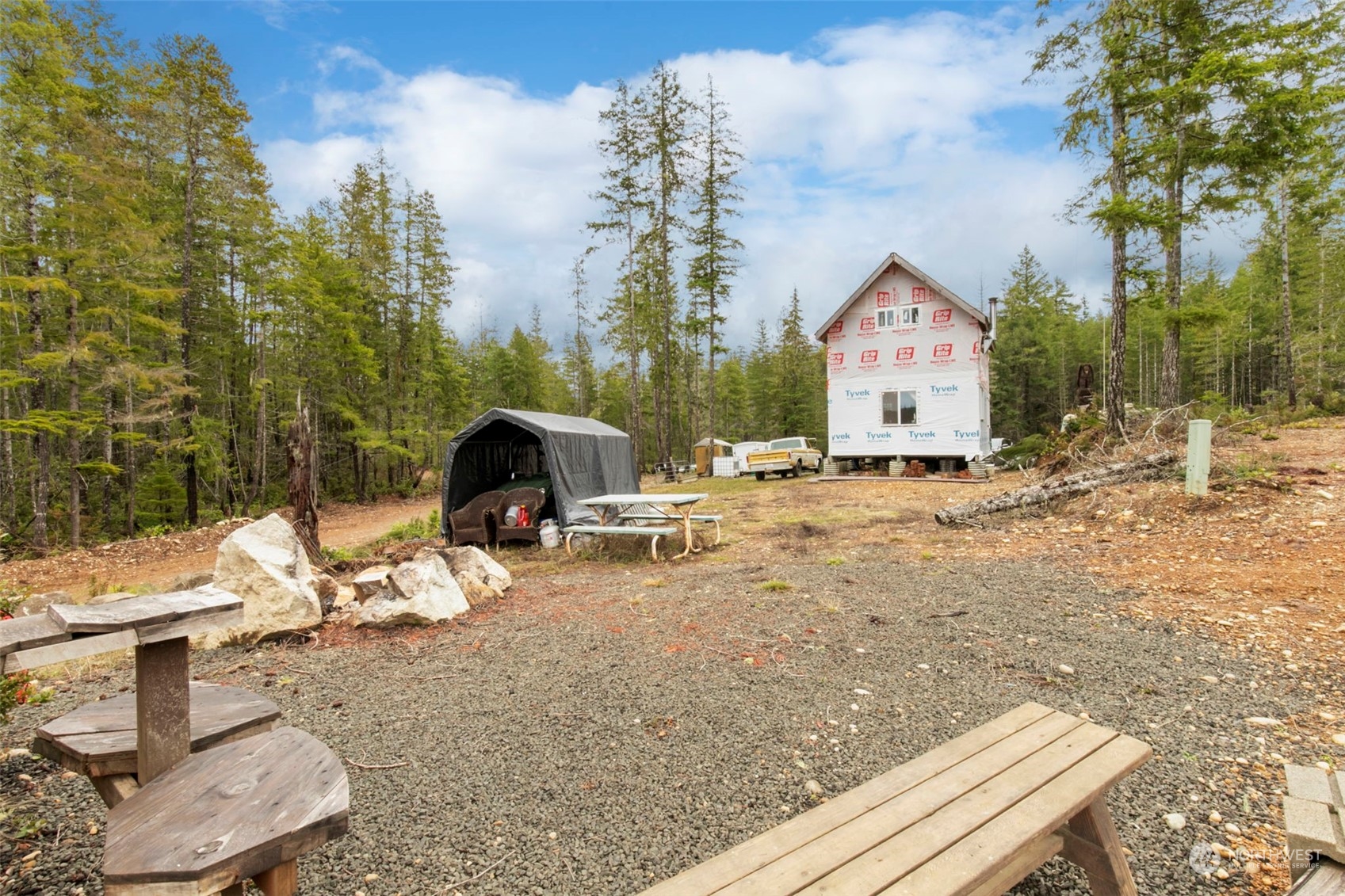 27 Northeast Dewatto Hills Road Tahuya, WA 98588 - Photo 15 of 29 a view of a backyard with sitting area