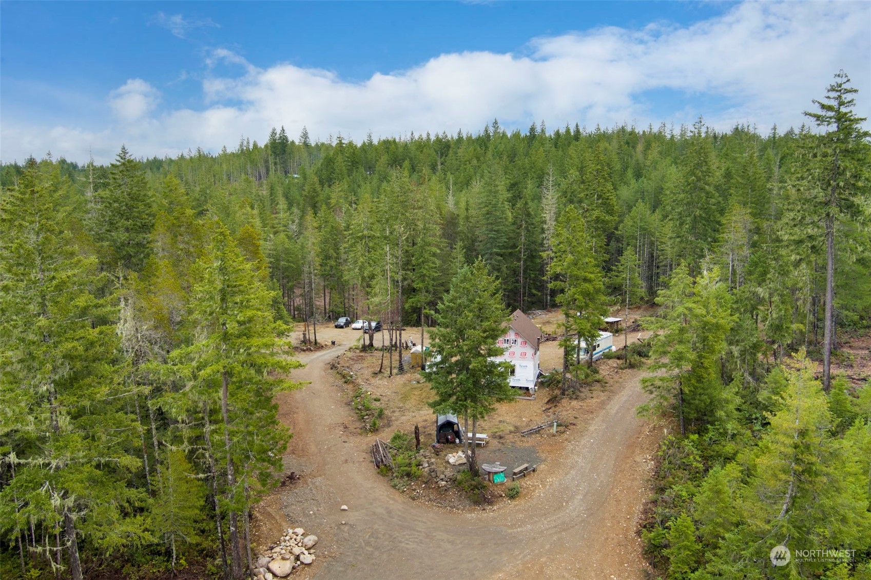 27 Northeast Dewatto Hills Road Tahuya, WA 98588 - Photo 10 of 29 a view of a lake with a city