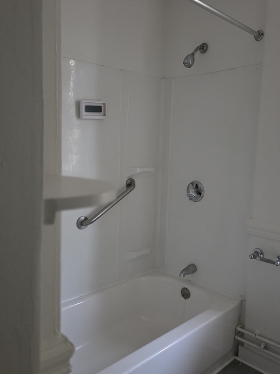 47 Webster Street, Unit 2 Lynn, MA 01902 - Photo 4 of 5 a bathroom with a bathtub