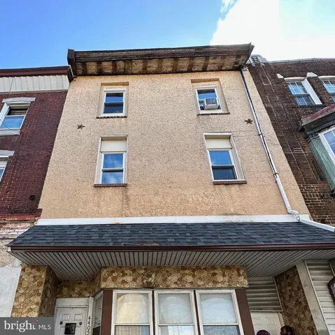 a front view of a house with a balcony
