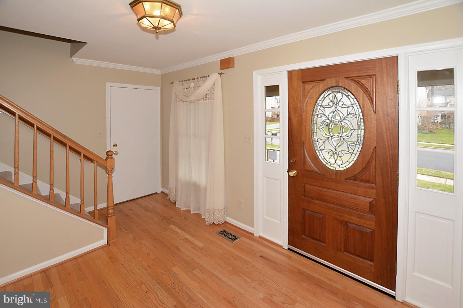 6113 Eagle Landing Road Burke, VA 22015 - Photo 1 of 41 Lovely receiving Foyer w/hardwd & Crown Molding.