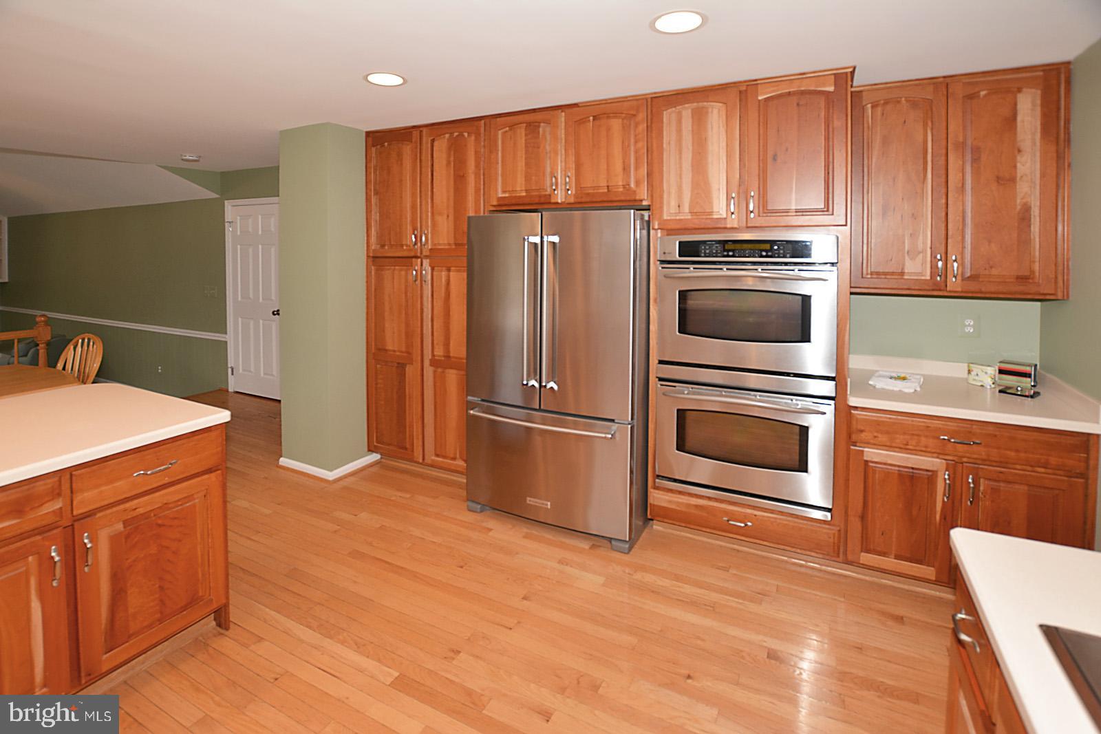6113 Eagle Landing Road Burke, VA 22015 - Photo 9 of 41 Twdoor pantry with slide-out drawers.
