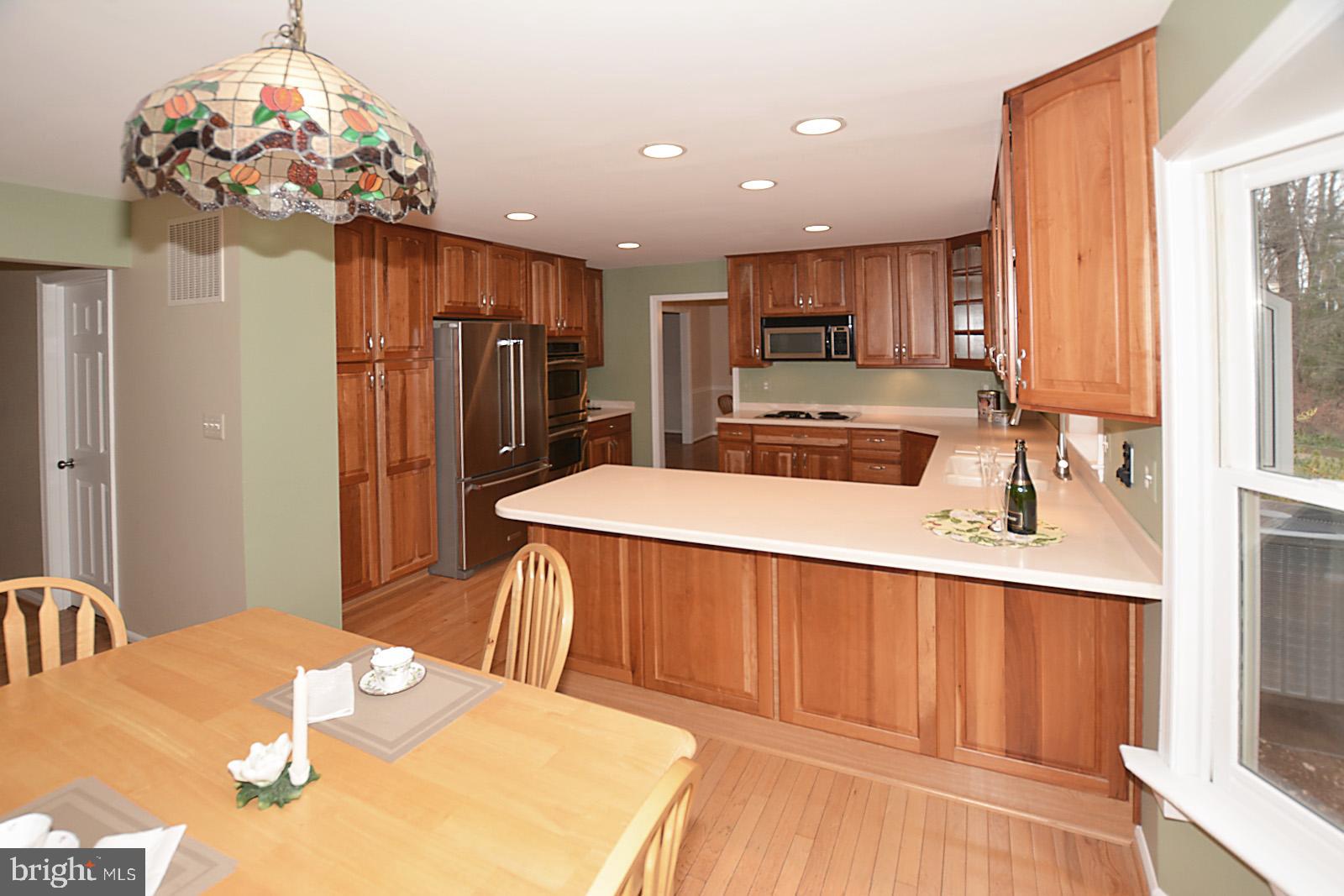 6113 Eagle Landing Road Burke, VA 22015 - Photo 12 of 41 Gleaming oak hardwood flooring..