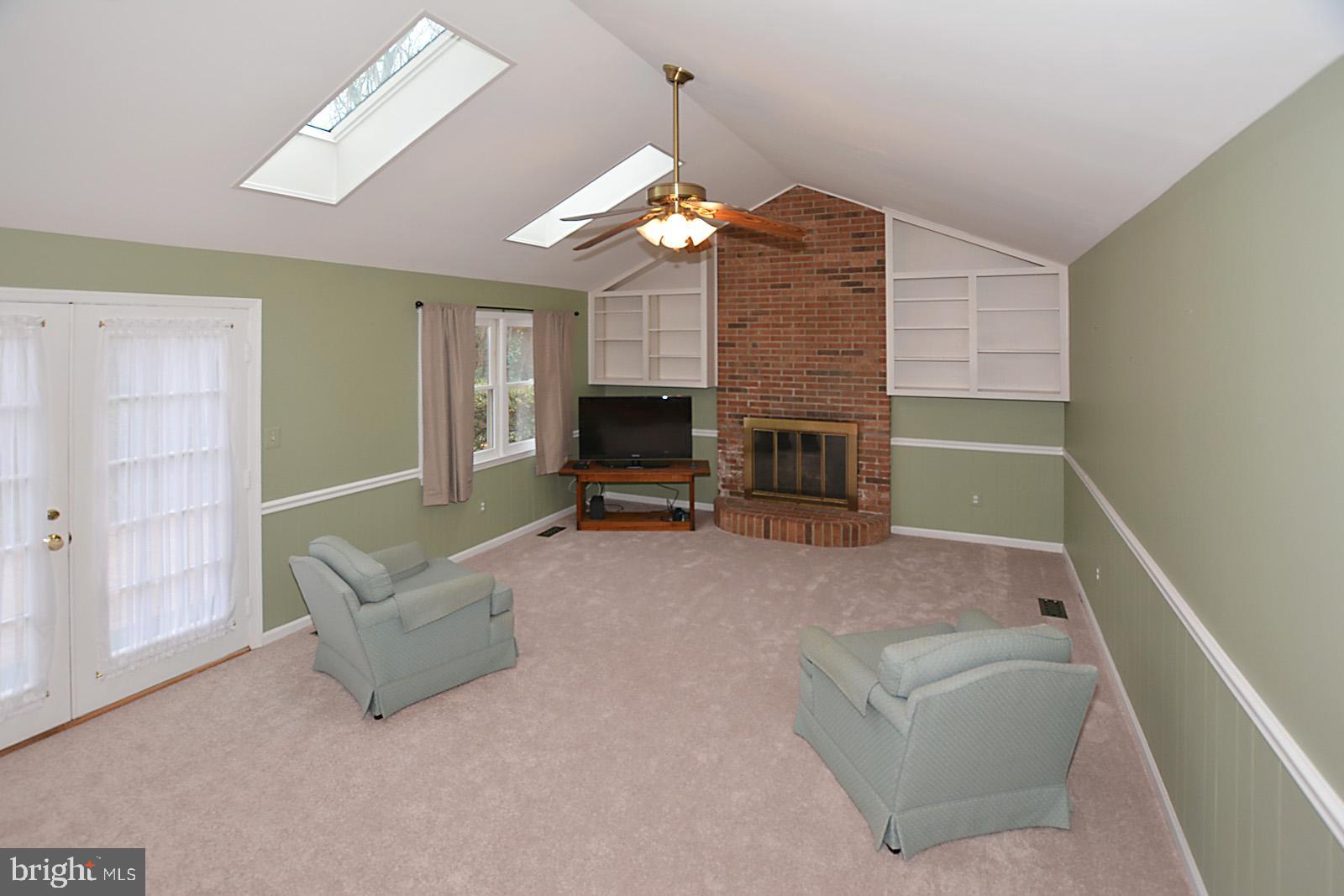 6113 Eagle Landing Road Burke, VA 22015 - Photo 18 of 41 Newly carpeted FR has atrium door to brick patio.