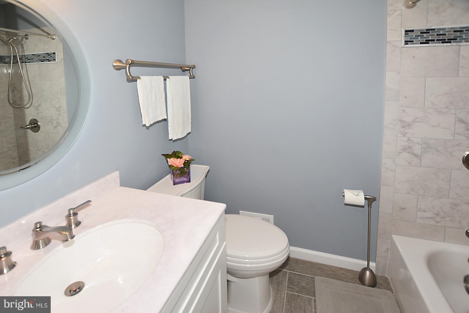 6113 Eagle Landing Road Burke, VA 22015 - Photo 28 of 41 2nd full BA w/designer tiled wall & porcelain fl.
