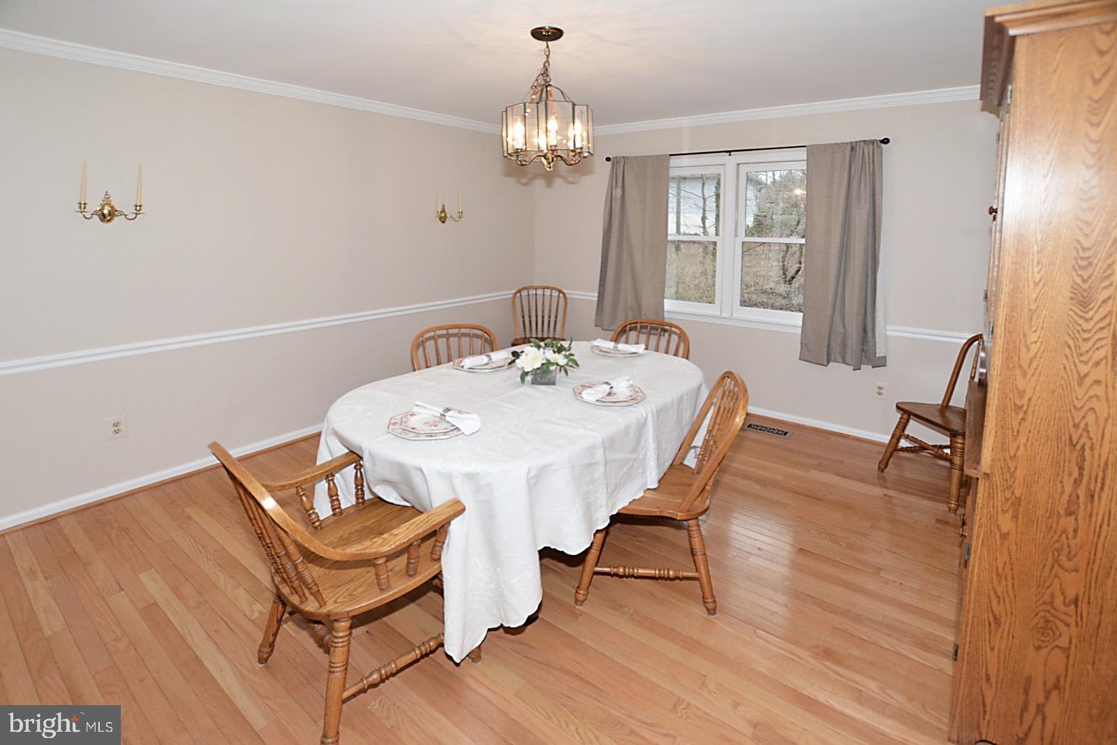 6113 Eagle Landing Road Burke, VA 22015 - Photo 4 of 41 Formal DR with Crown Molding & Chair Rail.