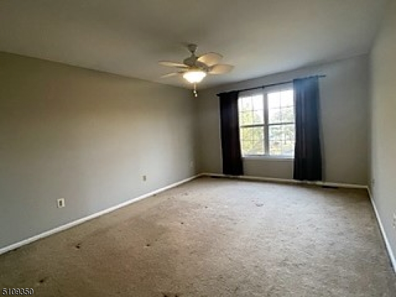 13 Andover Circle Princeton, NJ 08540 - Photo 16 of 19 an empty room with a empty space and a window