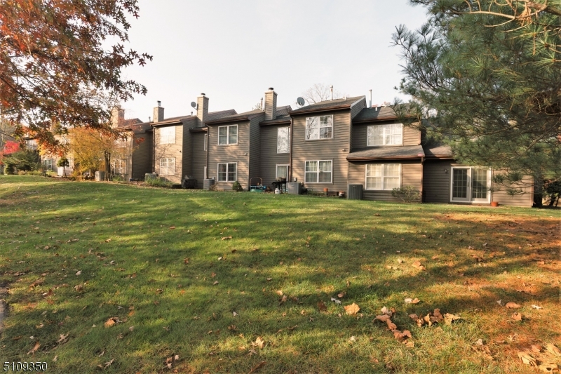 13 Andover Circle Princeton, NJ 08540 - Photo 18 of 19 a tall building with trees in front of it