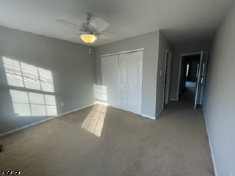 13 Andover Circle Princeton, NJ 08540 - Photo 10 of 19 an empty room with windows and closet
