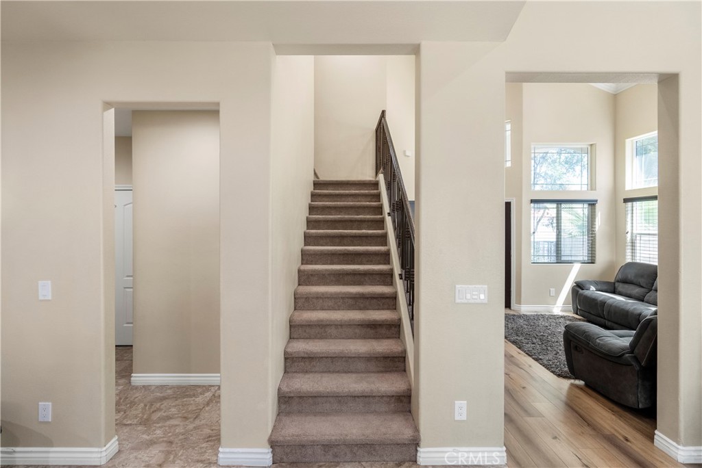 6800 Arlington Avenue Riverside, CA 92504 - Photo 11 of 25 a view of a livingroom with furniture and staircase