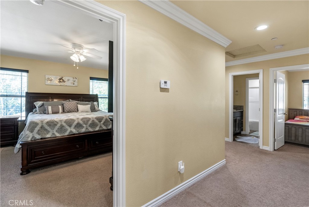 6800 Arlington Avenue Riverside, CA 92504 - Photo 15 of 25 a bedroom with a bed and a view of living room