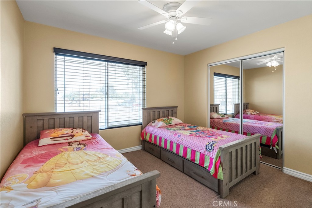 6800 Arlington Avenue Riverside, CA 92504 - Photo 18 of 25 a bedroom with a bed and window