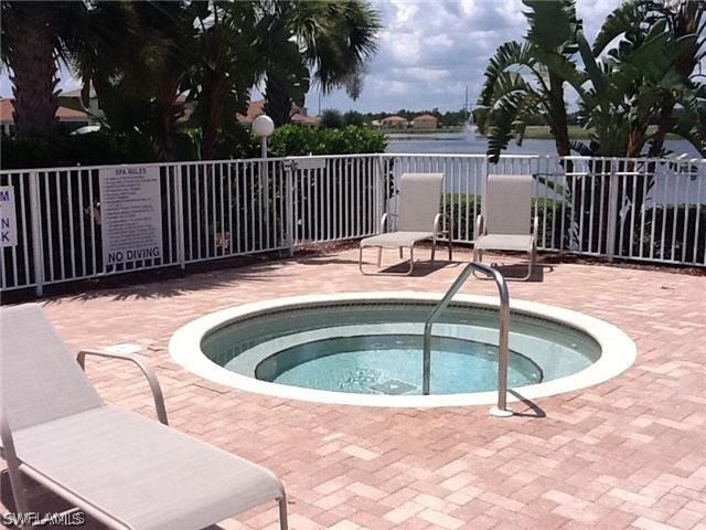 11698 Eros Road Lehigh Acres, FL 33971 - Photo 28 of 34 a view of outdoor space with swimming pool and furniture