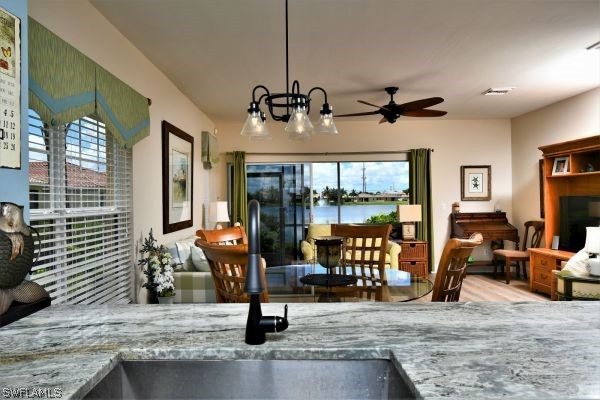11698 Eros Road Lehigh Acres, FL 33971 - Photo 7 of 34 a view of a livingroom with furniture and windows