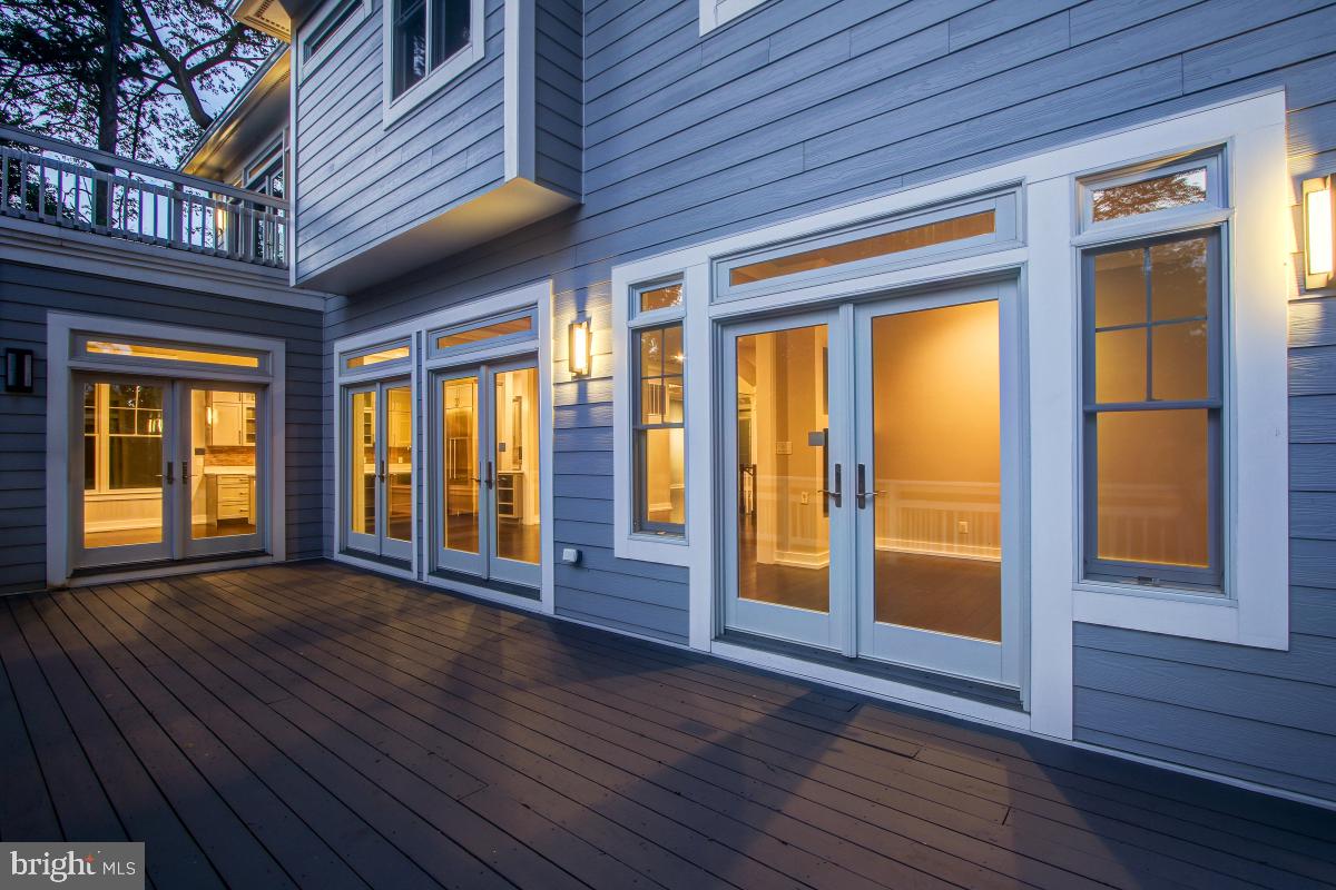 9814 Fernwood Road Bethesda, MD 20817 - Photo 29 of 31 Elegant outdoor living space at dusk.