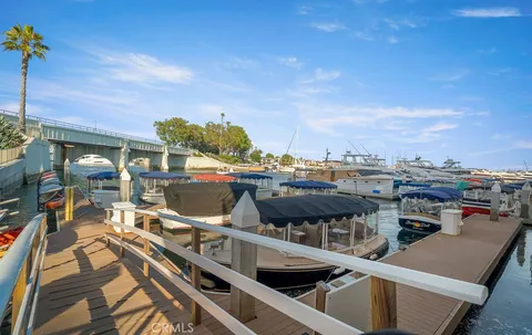a view of a balcony with two chairs and a table