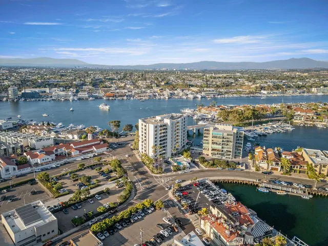 an aerial view of city and lake