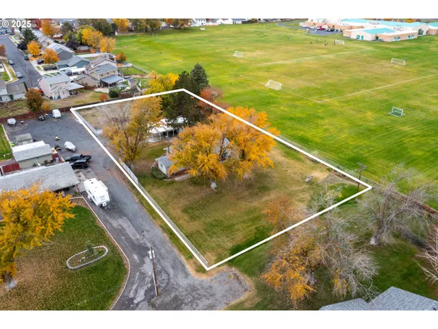 a view of swimming pool with a yard