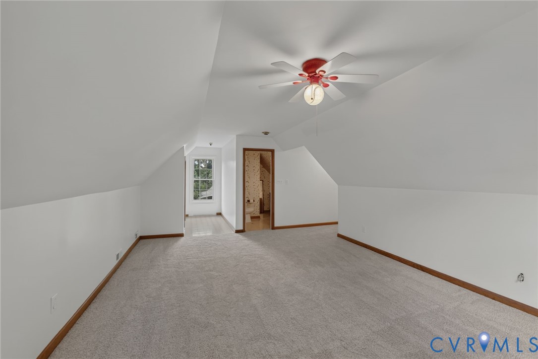 3007 Five Forks Road Pamplin, VA 23958 - Photo 40 of 82 Carpeted flooring, sloped ceilings, a window, and