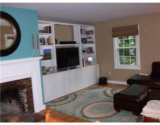 22 Broad Cove Road Cape Elizabeth, ME 04107 - Photo 5 of 13 Living Room. Shelving is not...