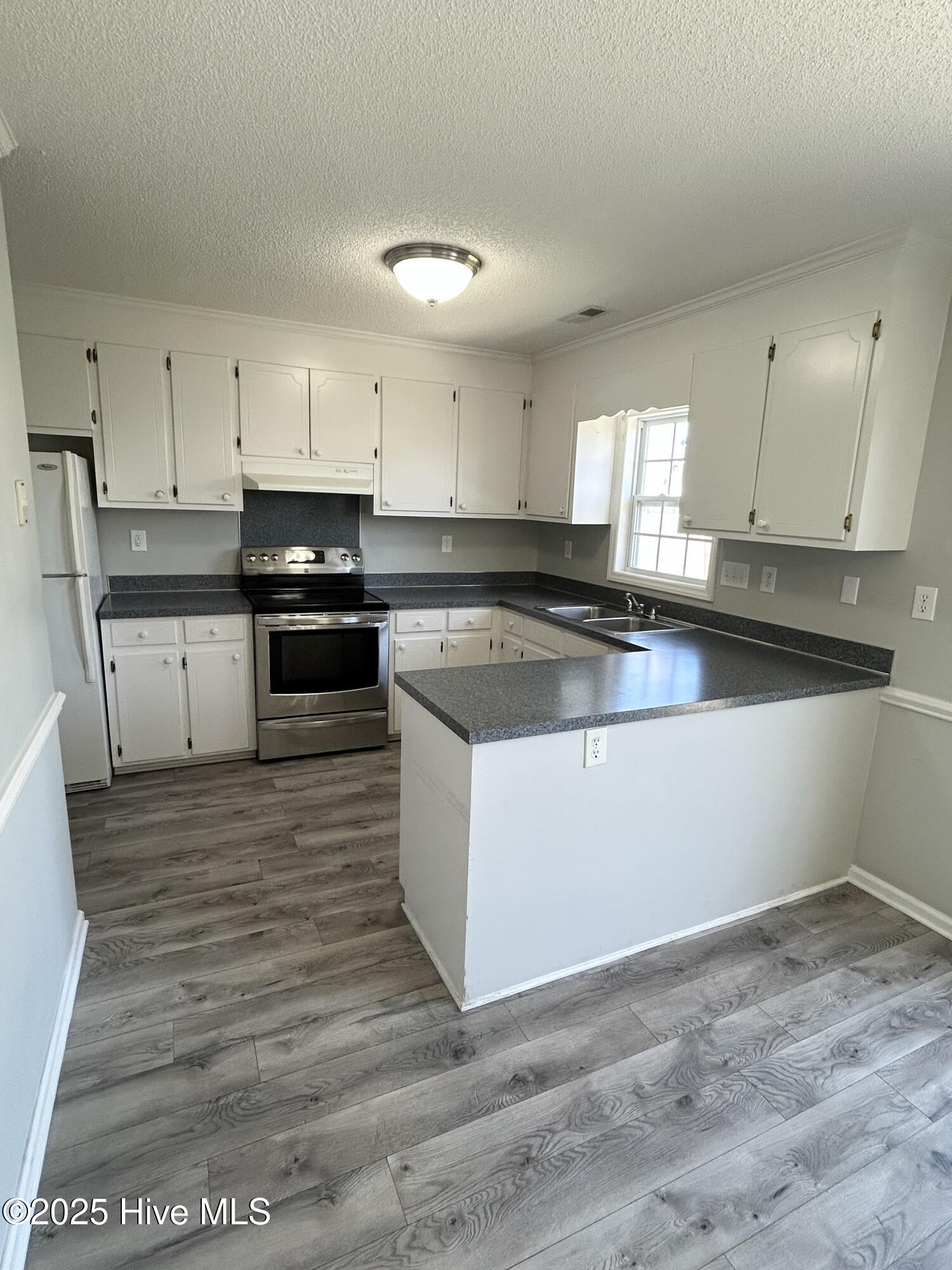 890 Spring Forest Road, Unit I8 Greenville, NC 27834 - Photo 6 of 19 IMG_1512