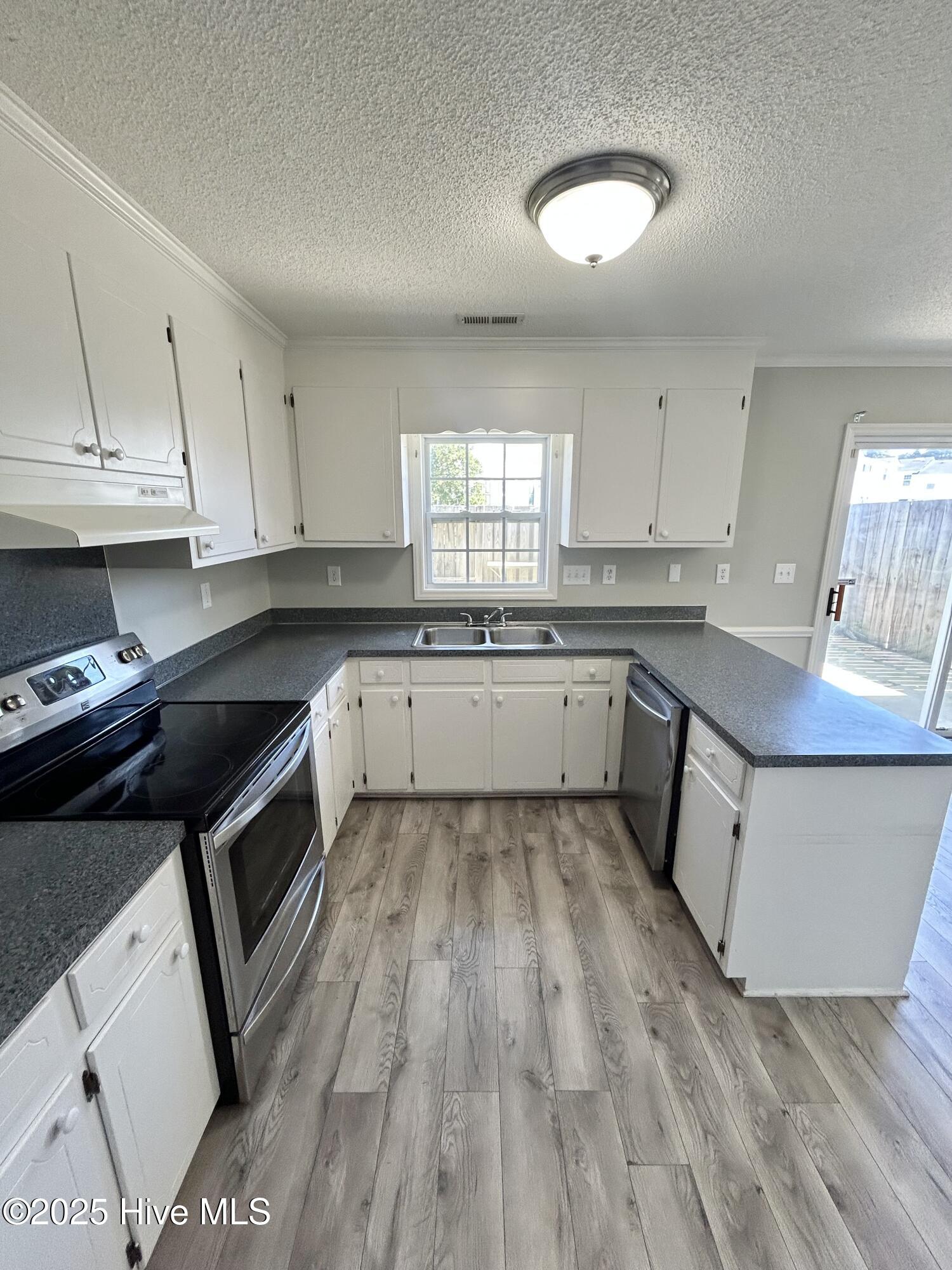 890 Spring Forest Road, Unit I8 Greenville, NC 27834 - Photo 7 of 19 IMG_1514