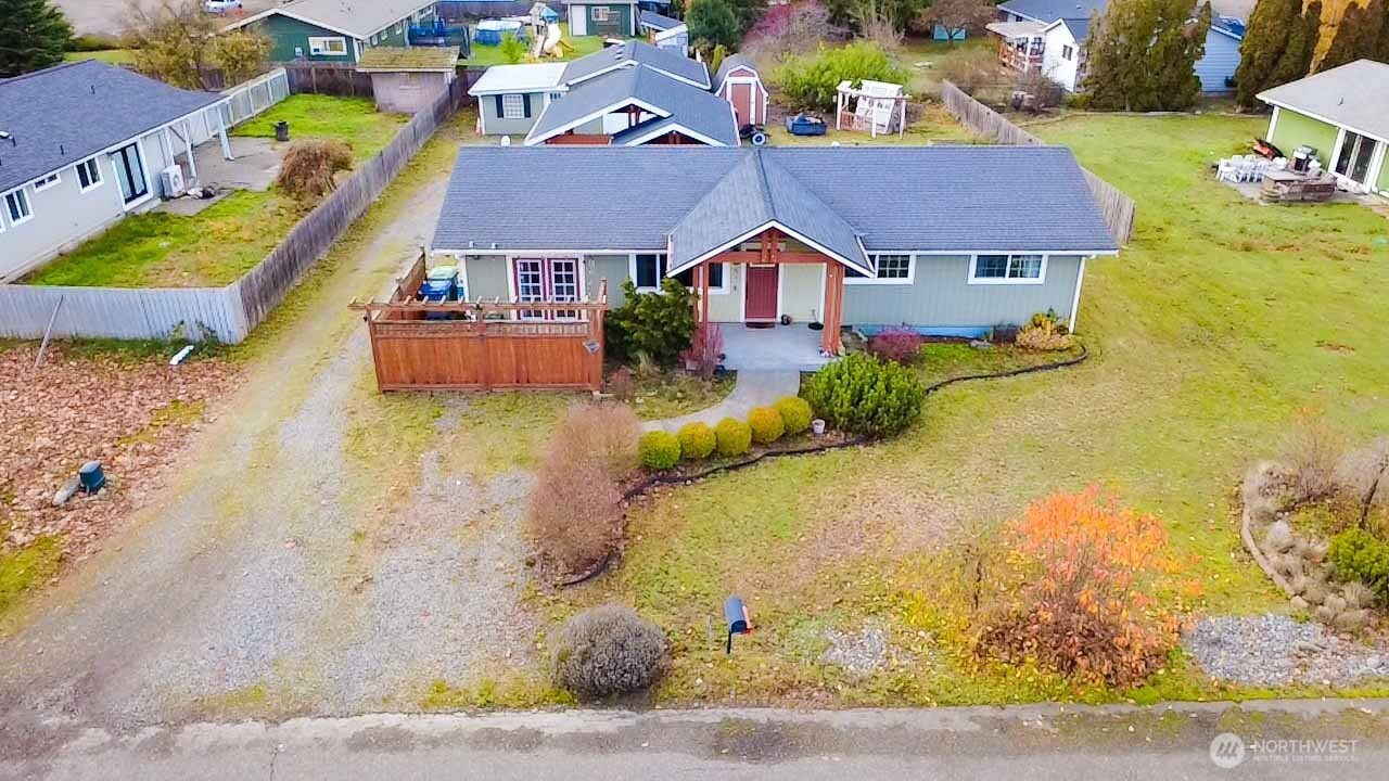 151 Valley View Drive Sequim, WA 98382 - Photo 40 of 40 a aerial view of a house with swimming pool and large trees