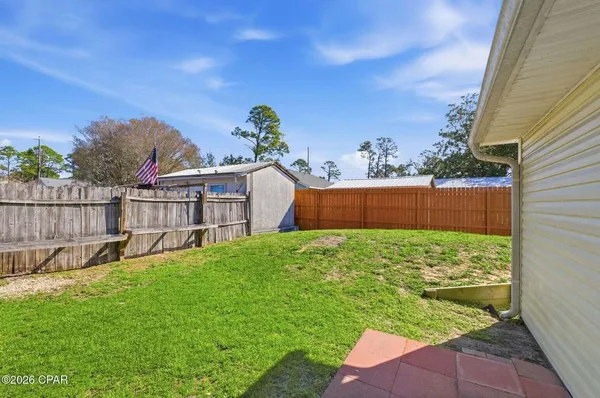 a view of backyard with green space