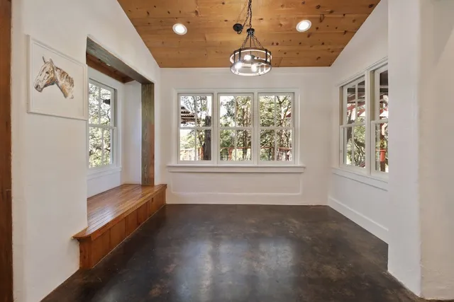 an empty room with windows