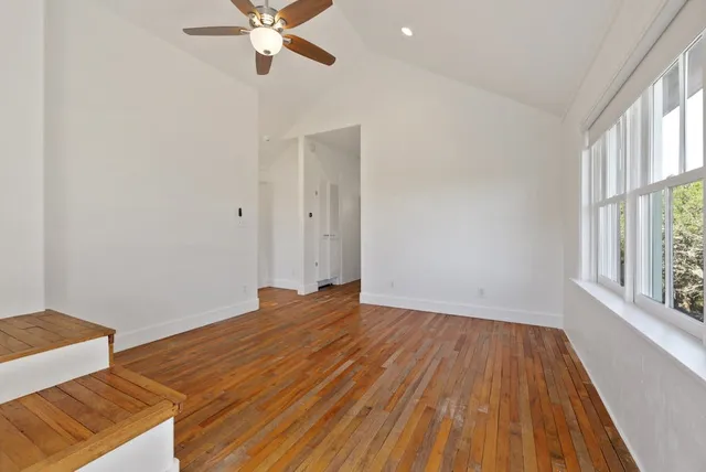 a bathroom with a glass shower door