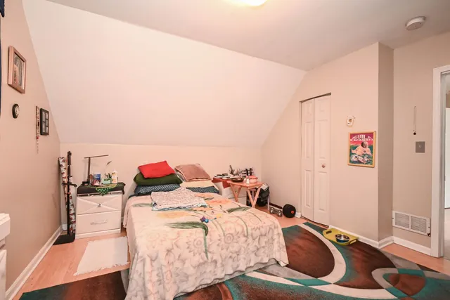 a bed room with a bed and a couch