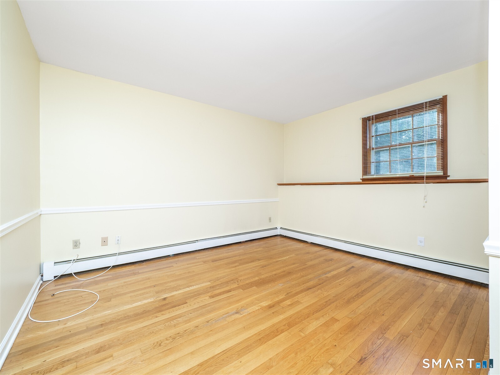 267 Thayer Pond Road Wilton, CT 06897 - Photo 27 of 28 wooden floor in a room