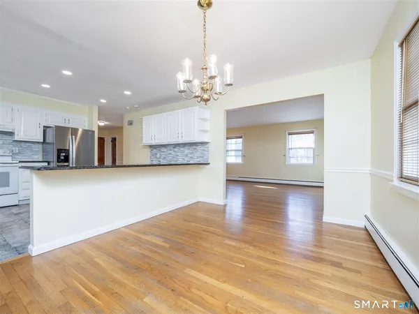 a view of kitchen with sink and cabinet