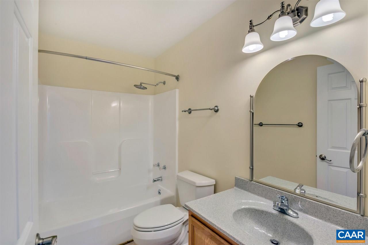 380 Chapel Road Ruckersville, VA 22968 - Photo 15 of 25 a bathroom with a sink toilet and shower