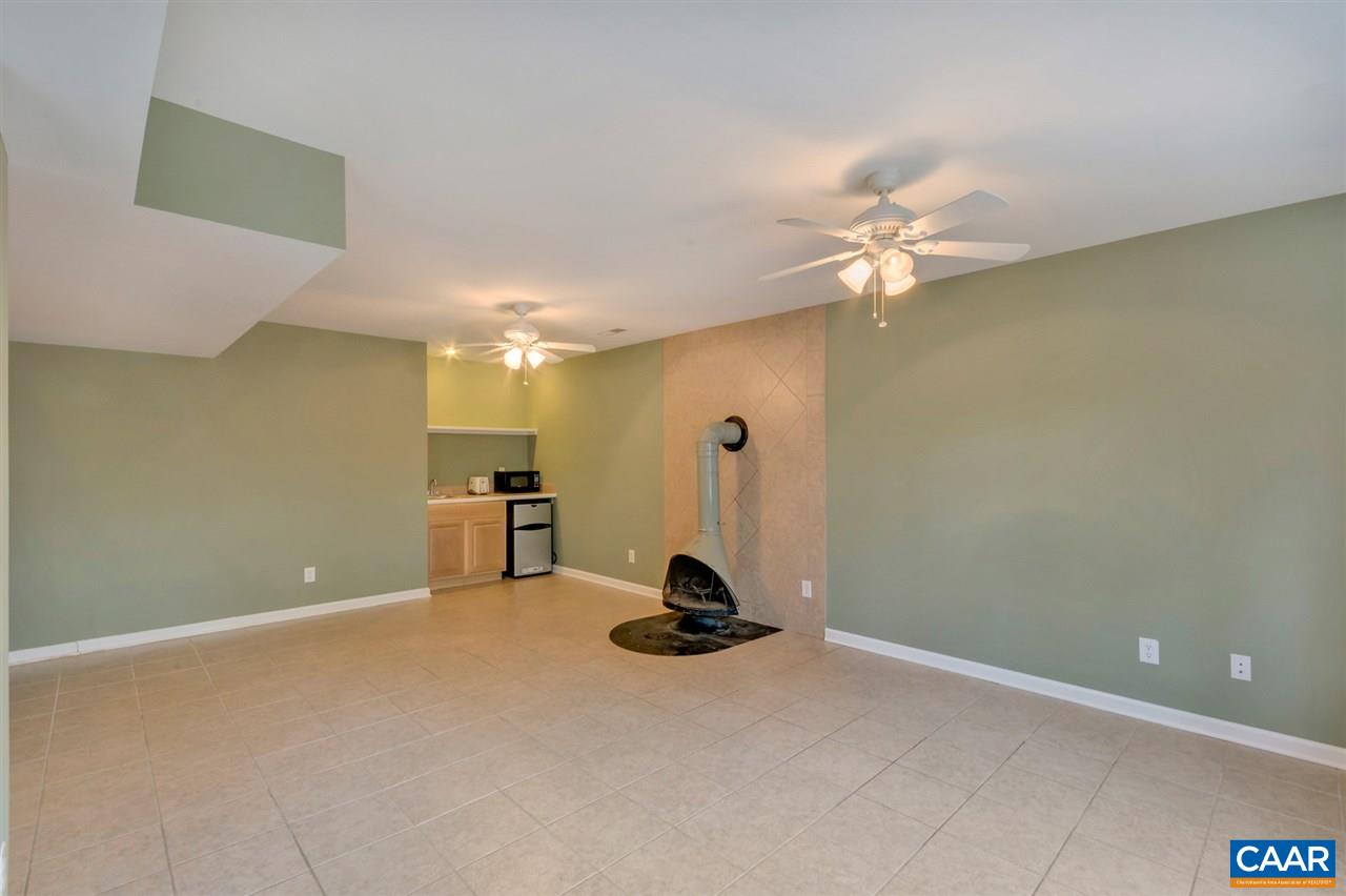 380 Chapel Road Ruckersville, VA 22968 - Photo 16 of 25 a view of a room with gym equipment