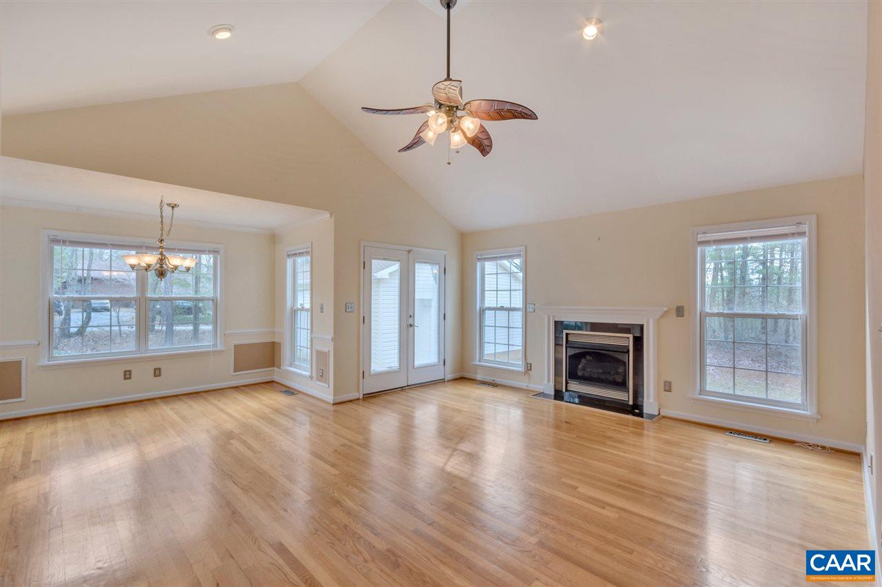 380 Chapel Road Ruckersville, VA 22968 - Photo 3 of 25 a view of an empty room with wooden floor and a window