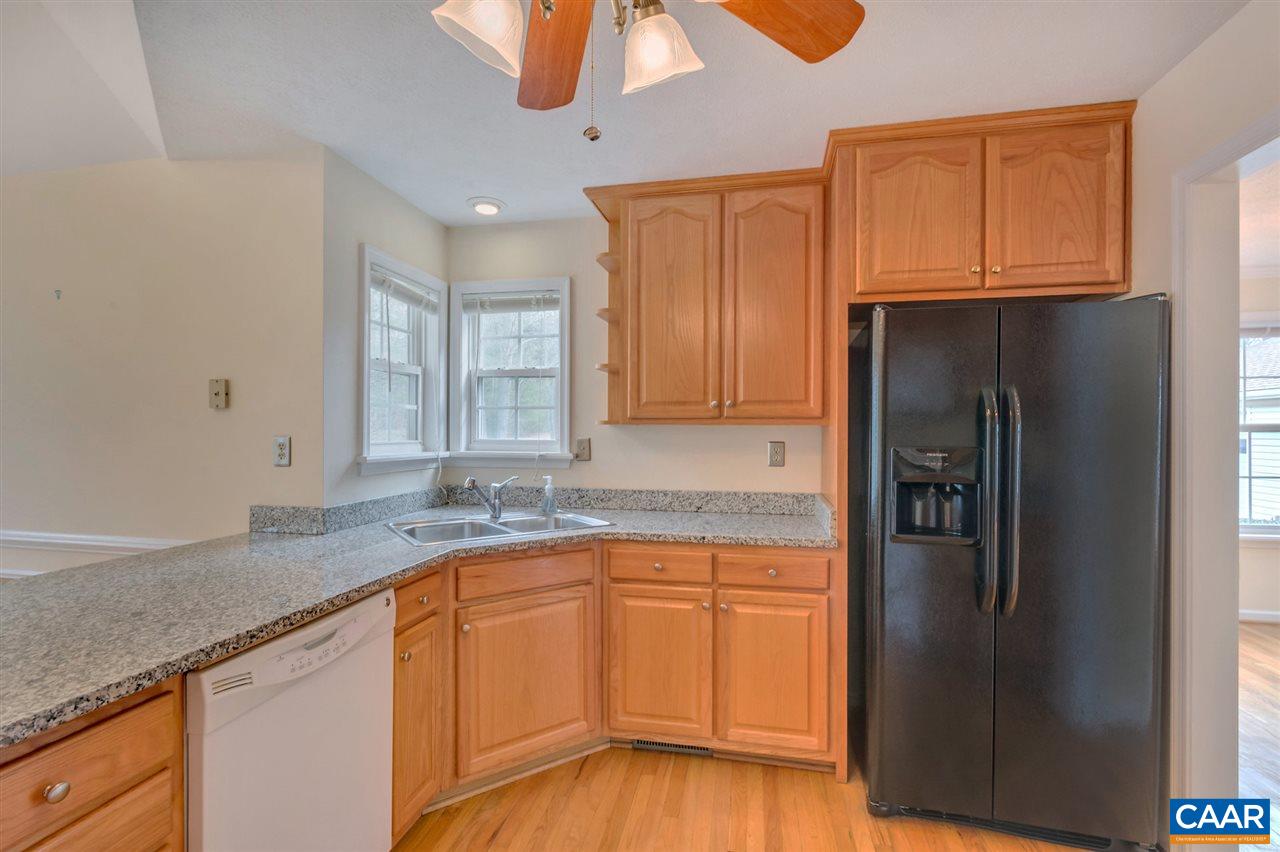 380 Chapel Road Ruckersville, VA 22968 - Photo 7 of 25 a kitchen with stainless steel appliances granite countertop a refrigerator a sink and dishwasher