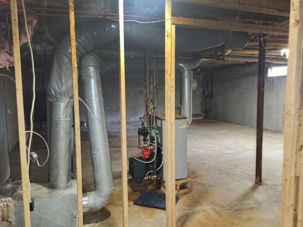 39 Ruggles Street Gilbertville, MA 01031 - Photo 12 of 14 a close view of water heater room