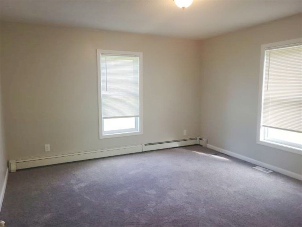 39 Ruggles Street Gilbertville, MA 01031 - Photo 10 of 14 an empty room with a window