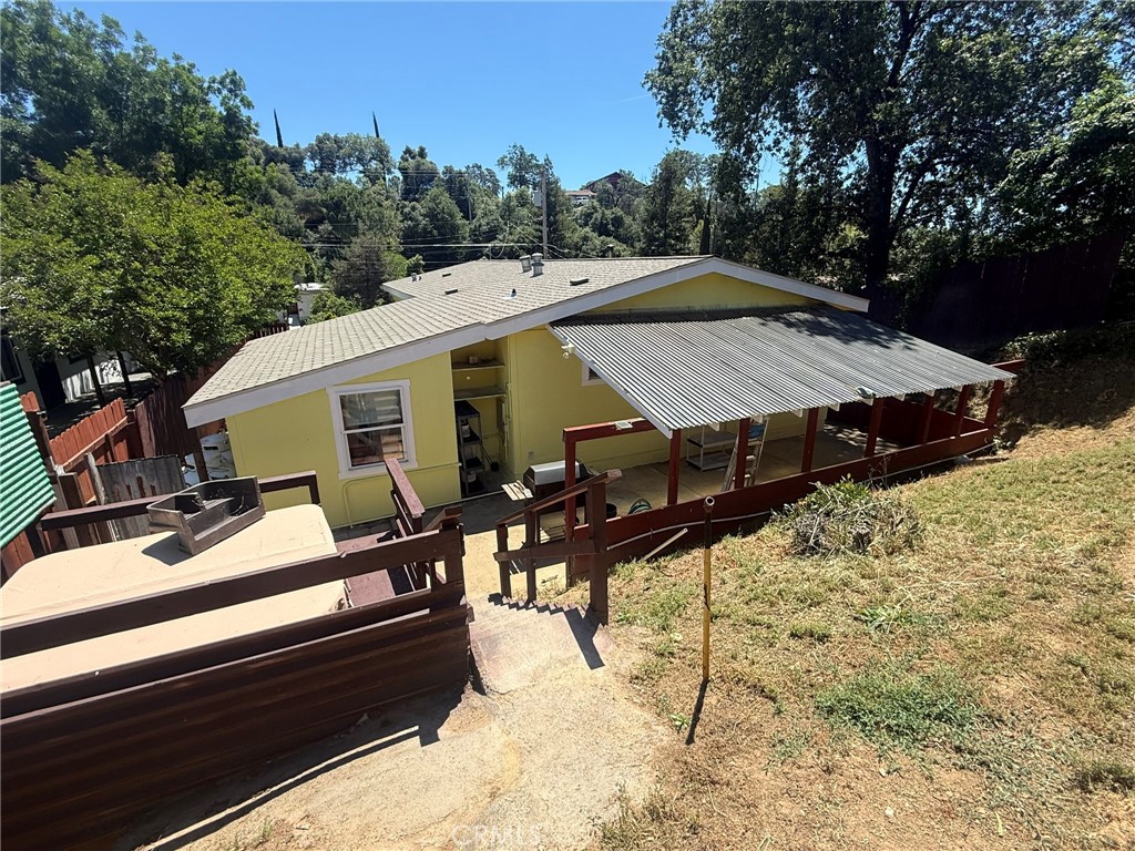 6845 Floyd Way Nice, CA 95464 - Photo 5 of 59 a view of a house with backyard and sitting area