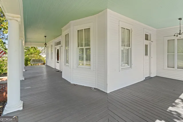 a front view of a house with a porch