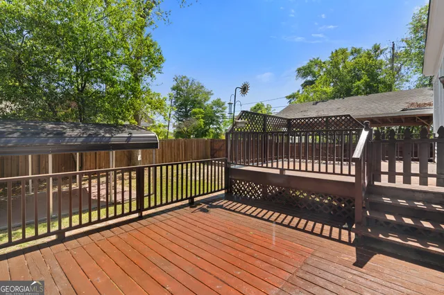 a picture of a bathroom with a shower