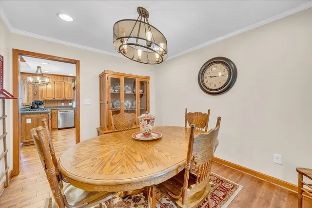 a kitchen with stainless steel appliances granite countertop a sink and cabinets