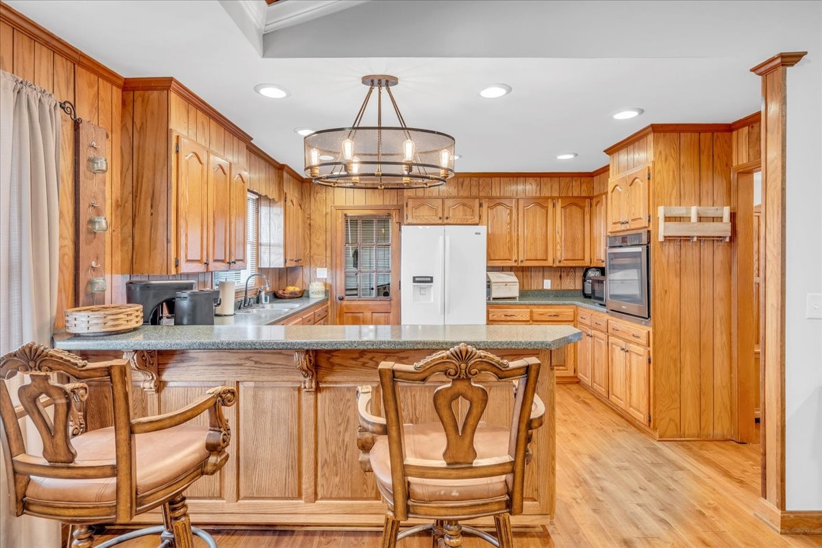 675 Bible Crossing Road Winchester, TN 37398 - Photo 12 of 35 a kitchen with stainless steel appliances granite countertop a sink and cabinets